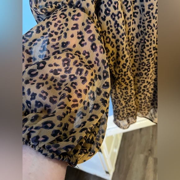 CeCe Smocked Off-Shoulder
Leopard Print Blouse in Spice - Picture 7 of 10